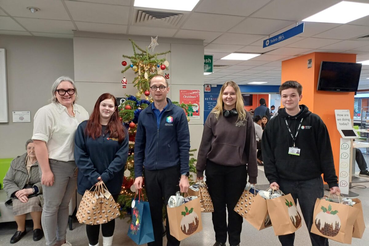 Spreading festive cheer: students support elderly patients at St Peter’s Hospital