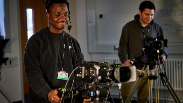 Media students learn how to use film cameras in Brooklands Technical College Media Suite