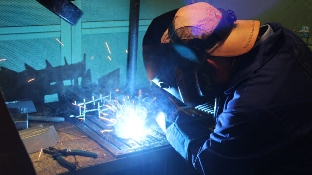 Manufacturing students shows off welding skills in engineering workshop