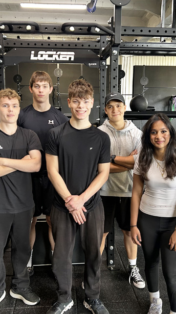 Sport students gather round for photo opportunity at LOCKER Gym in Addlestone